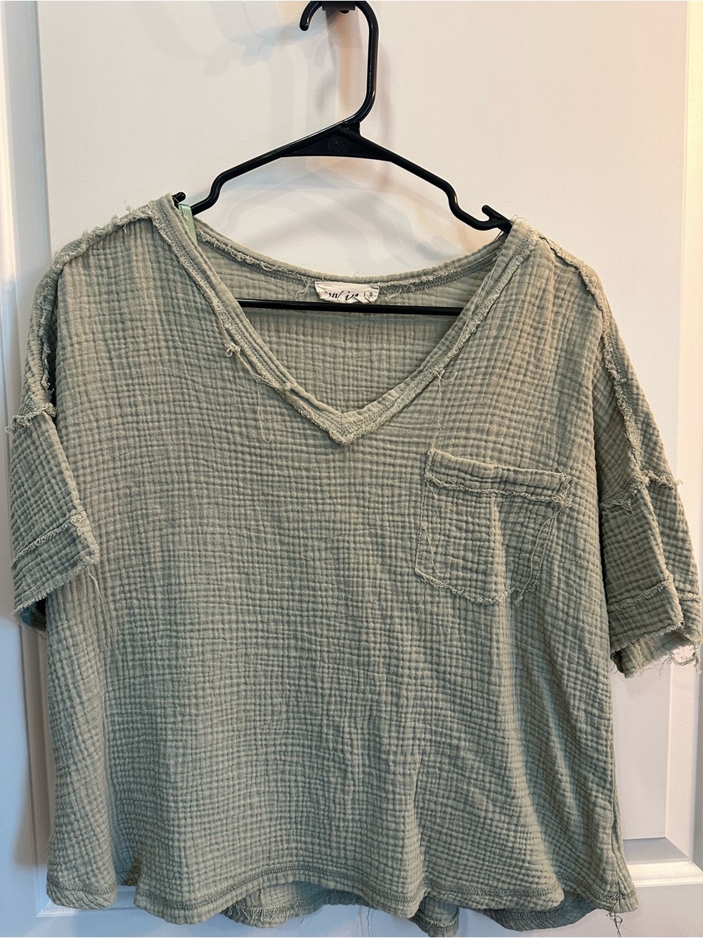 Boutique Distressed V-Neck Short Sleeve Pocket Tee in Sage Green